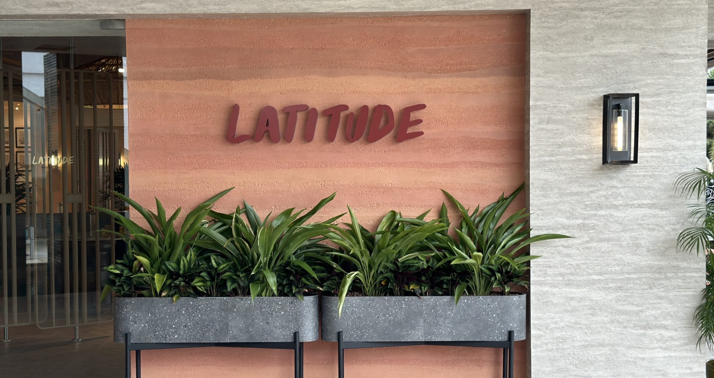 Latitude Terrace Entrance Logo Wall